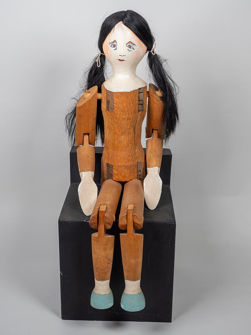 Carved and painted doll sculpture by Marjorie White Williams